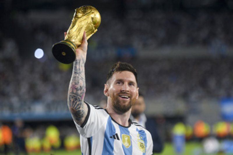 argentinas-lionel-messi-hoists-the-fifa-world-cup-trophy-during-a-celebration-ceremony-for-local-fans-after-an-international-friendly-soccer-match-against-panama-thursday-march-23-2023-c42f5749b7af019c6b60083b4bdb6d791679636662.jpg