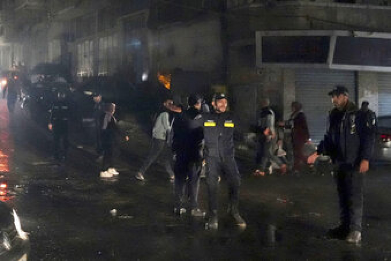 hamas-police-officers-secure-the-scene-of-burned-apartment-on-the-third-floor-of-a-three-story-building-in-jebaliya-refugee-camp-northern-gaza-strip-thursday-nov-21928810152148293ac59a9d855300891699471867.jpg