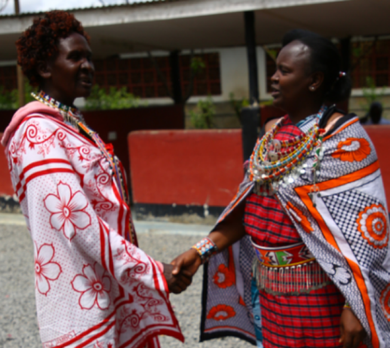naomy-kolian-and-jane-kaliko-share-light-moments-after-a-tiring-day-of-engaging-the-community-at-a-public-forum-on-the-need-to-stop-fgm-a8126925cd62905e4f1ecbc82910fe971721105220.png