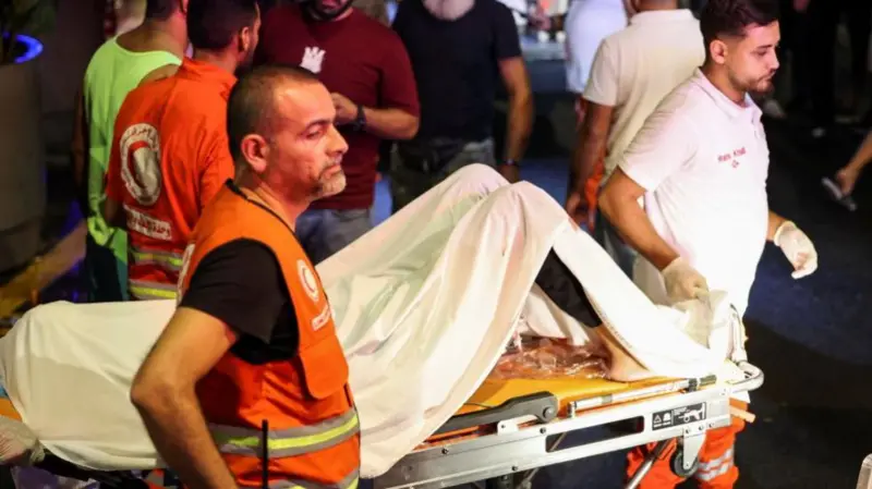 a-victim-of-pager-explosion-on-a-stretcher-outside-the-american-university-of-beirut-medical-center-yesterday-e2243e903c12efda7e733ef2e3a574671726647942.png
