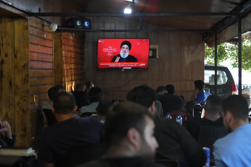 people-watch-the-speech-of-hezbollah-leader-hassan-nasrallah-on-a-tv-screen-as-they-sit-in-a-cafe-in-the-southern-suburbs-of-beirut-thursday-sept-e3eacdf35c98132cbc249c29dae530881726805418.png