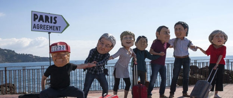 oxfam-activists-wearing-masks-of-the-leaders-of-the-2017-g7-summit-d646ae333b935b7fca5afd89fe3328341734676031.jpg