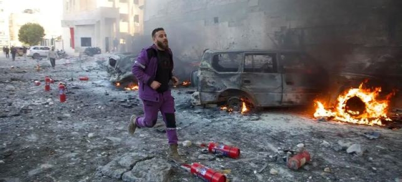 a-first-responder-rushes-through-the-aftermath-of-shelling-that-targeted-hospitals-and-displaced-camps-in-idlib-northwest-syria-file-cb7584dbbf3049173fef73024ed3feac1736486855.jpg