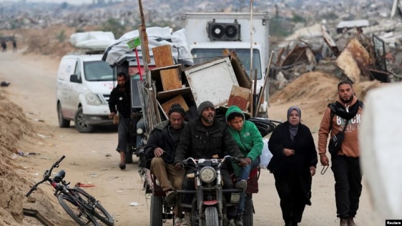 palestinians-make-their-way-after-israeli-forces-withdrew-from-the-netzarim-corridor-0ea822dfa5ca9417745a3bdc415b06cd1739152396.jpeg