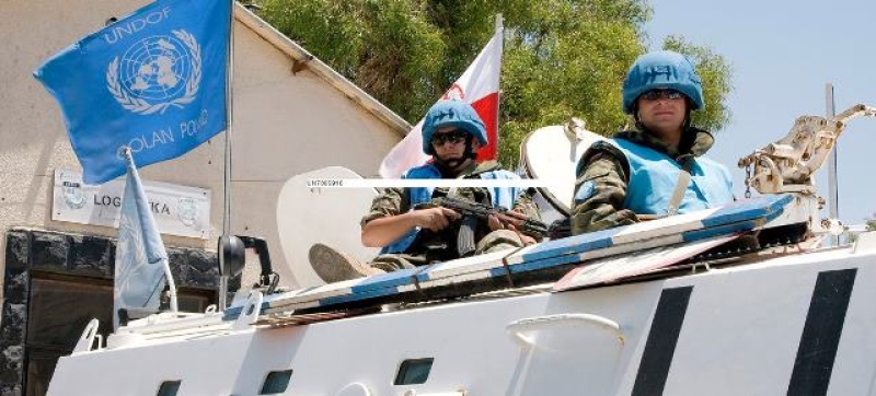 polish-peacekeepers-patrol-as-part-of-the-undof-observer-force-which-supervises-the-area-of-separation-between-israel-and-syria-file-a734297ead56ecba1bdcbacb39f041191741151285.jpg