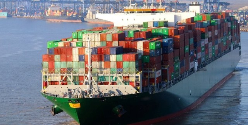 a-cargo-laden-container-ship-approaches-a-port-72be5c26e4fa74b81b042f49ca3f0fef1744427634.jpg