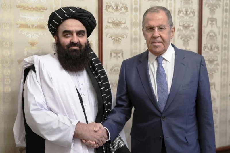 russian-foreign-minister-sergey-lavrov-right-and-acting-foreign-minister-of-afghanistan-amir-khan-muttaqi-pose-for-a-photo-in-moscow-russia-6aebff0d3af249c24504f9f782e5d7db1751603124.jpeg