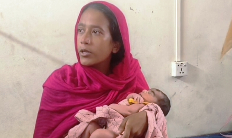 a-new-born-in-mothers-lap-after-caesarian-operation-on-monday-at-kalapara-b166c3a5978516188ce675790b93c95d1757952293.jpg