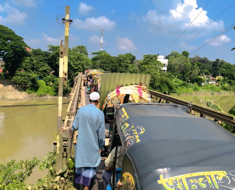 a-bailey-bridge-operates-at-the-proposed-gumti-bridge-site-in-cumilla-unb-9cf298742fa75d66d7c59b1f4c997c621761621982.jpg