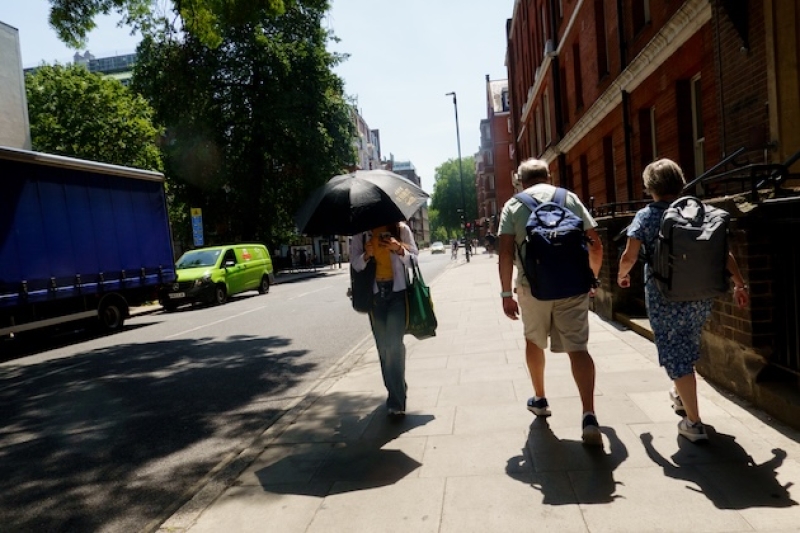 a-person-uses-an-umbrella-to-keep-cool-during-a-heatwave-in-london-england-in-june-2026-6963de39782cc7090f41bbc54db0cafd1785330393.jpg