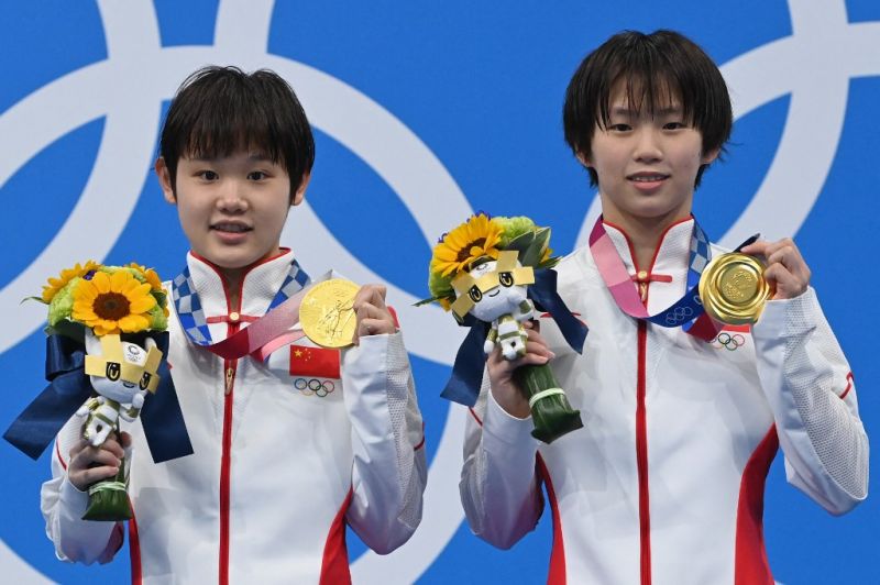 chinese-teens-win-olympic-diving-gold-to-keep-perfect-record-ffbea7ec3ebde28a5e033ee874339a471627401668.jpg