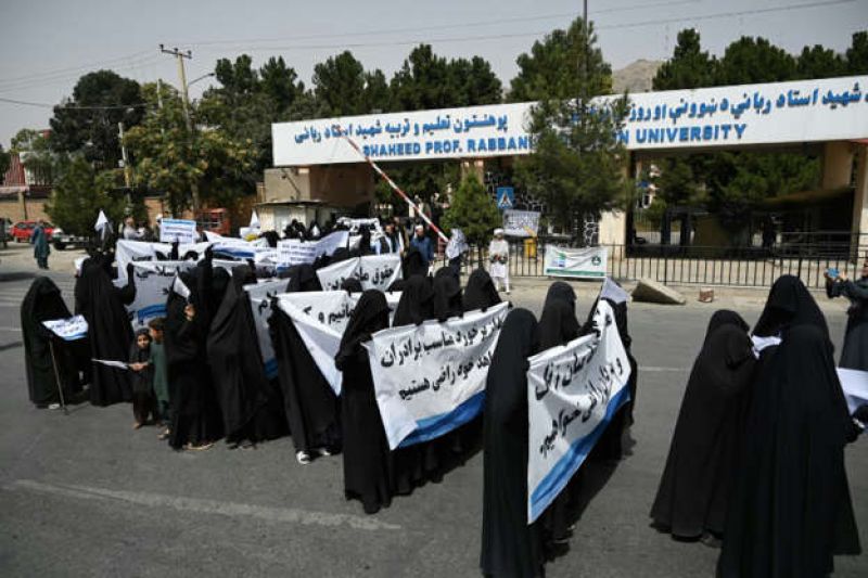 veiled-women-held-banners-and-placards-while-marching-during-a-pro-taliban-rally-outside-the-shaheed-rabbani-education-university-in-kabul-on-september-11-2021-6c61142d14c386404e6a4621581c44ba1631373752.jpg