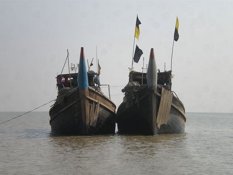 fishing-trawler-a-pair-of-fishing-trawlers-are-in-rest-at-kuakata-sea-beach-09a31c1803a010c72ea3dc088a0c1d871637474769.jpg