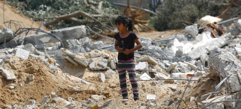 conflicts-a-girl-stands-near-the-rubble-of-a-three-storey-home-which-was-destroyed-during-heavy-bombardment-by-israeli-forces-in-the-gaza-strip-35706968f408073dbd4ffe3243c45ae01645676027.jpg