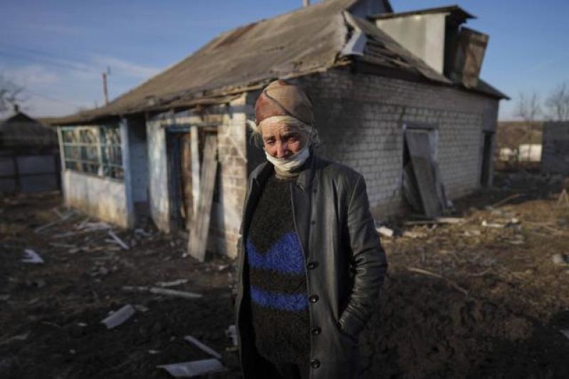 conflicts-tetyana-tomenko-in-front-of-her-house-which-was-damaged-during-shelling-in-novognativka-eastern-ukraine-february-20-2022-135a89c815cad44f8c7477a5aa5177081645729341.jpg