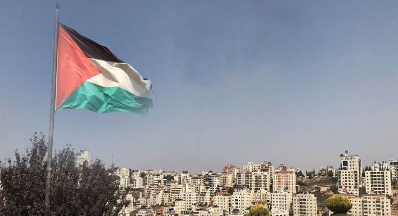 the-palestinian-flag-in-the-west-bank-city-of-ramallah-a0f5b590d4ba3a959357a6860942da2b1652422487.jpg