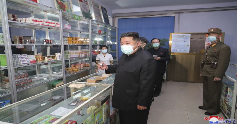 in-this-photo-provided-by-the-north-korean-government-north-korean-leader-kim-jong-un-center-visits-a-pharmacy-in-pyongyang-north-korea-sunday-may-15-2022-9e52db8033b2a8415ccf74a2810f4ea31652678025.jpg