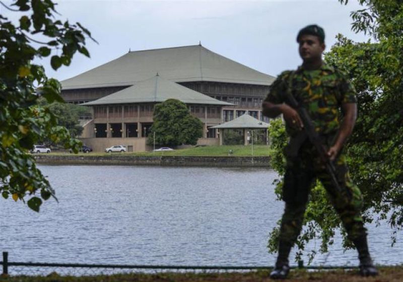 security-around-the-sri-lankan-parliament-building-in-the-capital-colombo-was-heightened-on-saturday-with-armed-masked-soldiers-on-guard-f25448018fb5c3dbab3dd3fac315dcae1658040302.jpg
