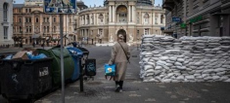 a-woman-walks-past-sandbags-piled-for-defensive-protection-in-odessa-ukraine-e995d1966b16cbcf3ea3cd27b1a0debc1659360331.jpg