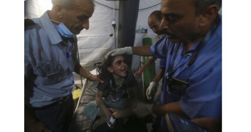 medics-treat-a-wounded-girl-at-the-al-najar-hospital-following-an-israeli-airstrike-on-their-family-building-in-rafah-southern-gaza-strip-saturday-aug-0c02167657c4ebfe8734b3b4d246d3571659859724.jpg