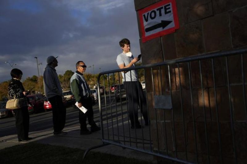 people-wait-in-line-to-vote-at-a-polling-place-tuesday-nov-1b2413a8102f0f7b70d9182e706571a31667967129.jpg