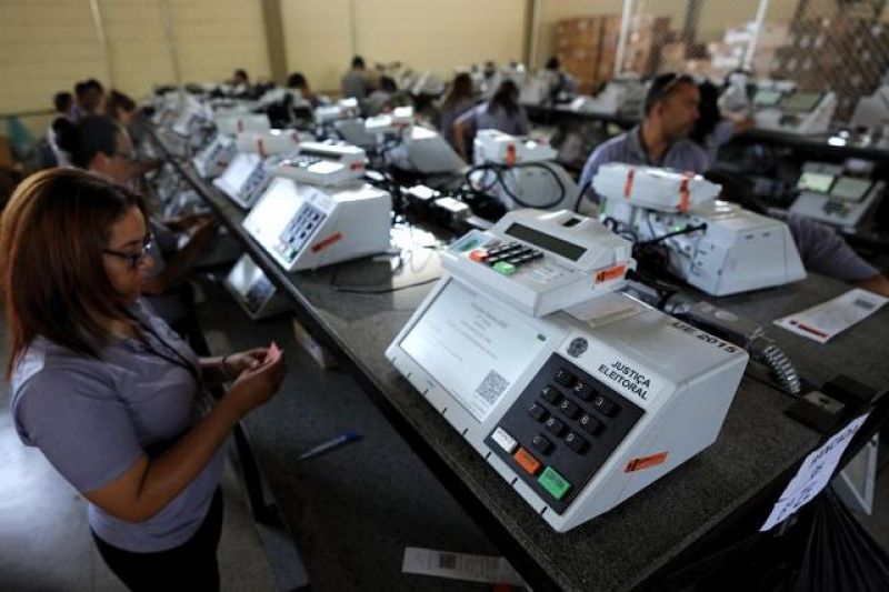 electoral-court-employees-work-on-the-final-stage-of-sealing-electronic-voting-machines-in-preparation-for-the-general-election-run-off-in-brasilia-brazil-oct-5545b32cdb38cebcacea695675fe3cad1669180868.jpg