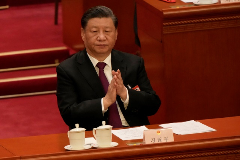 chinese-president-xi-jinping-applauds-at-a-session-of-chinas-national-peoples-congress-at-the-great-hall-of-the-people-in-beijing-friday-march-10-2023-18ac11e0be669a897419cf7fb894f3dc1678425446.jpg