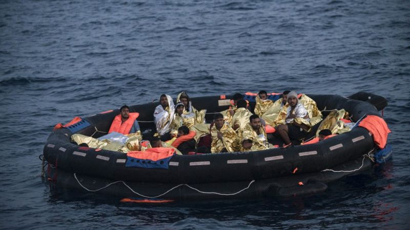 migrants-in-a-boat-b7db12756c40f83ca1abed05734c595c1679237883.jpg