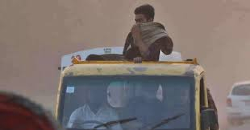 air-pollution-that-a-truck-helper-reacts-to-in-dhaka-city-on-thursday-34a27707296817e992bd2a72d130439d1681963781.jpg