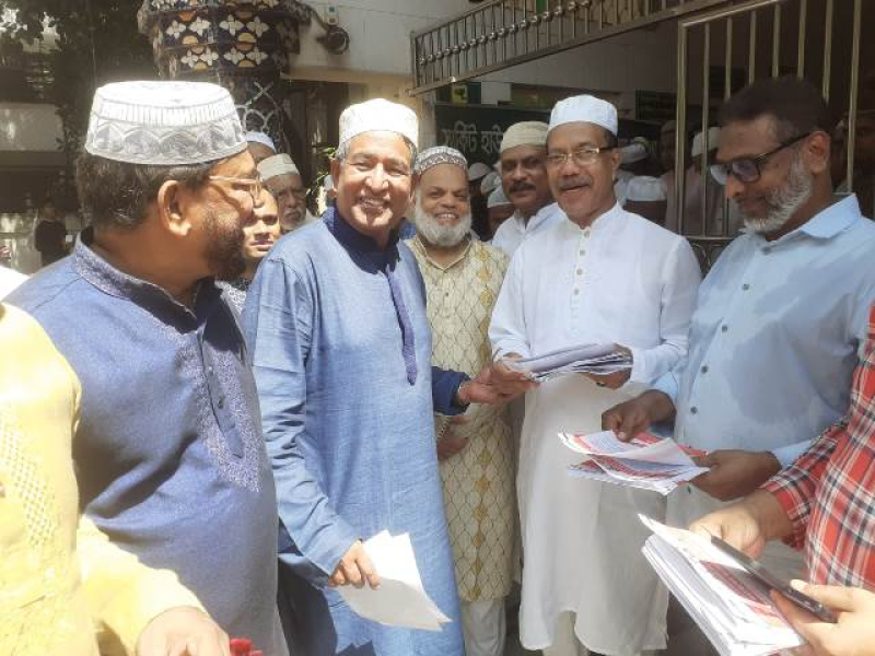 agriculture-minister-abdur-razzaque-with-leaflets-on-one-point-demand-handed-over-by-bnp-leader-fazlul-huq-milan-at-a-mosque-in-the-capital-on-friday-1ab2cc0763332302809b78ff5348f7c81695049473.jpg