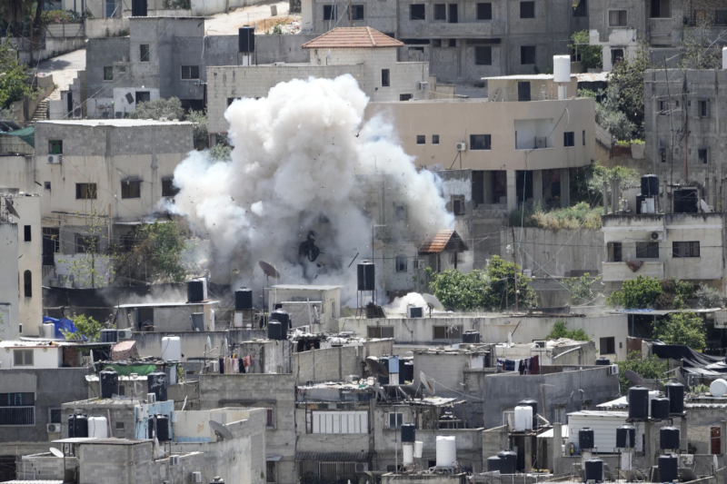 smoke-rises-from-an-explosion-during-an-israeli-military-raid-in-the-nur-shams-refugee-camp-near-the-west-bank-town-of-tulkarem-saturday-april-20-2024-6012edeb10e22675794997025d41a9c71713668437.png