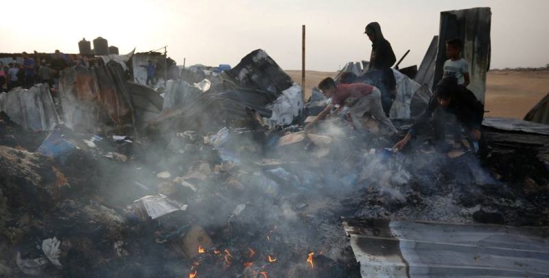 israeli-air-strikes-on-26-may-hit-a-camp-for-displaced-people-in-rafah-southern-gaza-claiming-35-lives-35e16b577371123c3e055989f1e3e3c51717006173.jpg