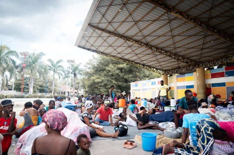 families-residing-in-a-makeshift-displacement-camp-located-in-the-main-square-of-leogane-haiti-ee527f364475ffb061624d5eb9d4361d1726986254.jpg