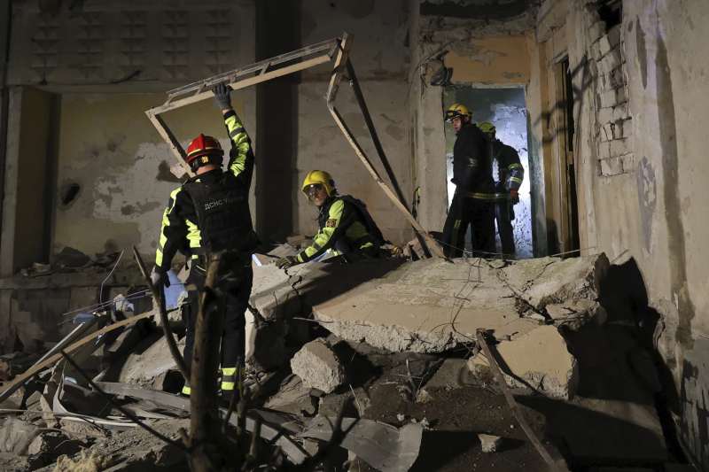 emergency-services-workers-move-rubble-after-a-russian-strike-on-a-residential-building-in-kharkiv-ukraine-early-sunday-sept-45f0e863bd0841dfa8baf5371cab58621727064696.png