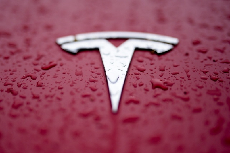 a-tesla-logo-is-shown-on-feb-9d494e789cfbf6c212a9028def7ab85c1728650444.jpg