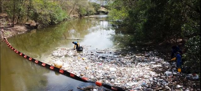 plastic-waste-collects-in-a-river-in-trinidad-5c93dc414478a6558621834c6891dcd61730354410.jpg