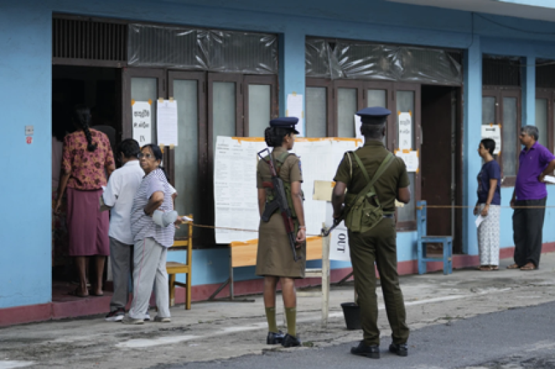 people-arrive-to-cast-their-votes-at-a-polling-station-in-the-parliamentary-election-in-colombo-sri-lanka-thursday-nov-90188ee14a4772eb5d772b2fcfad37d11731558799.png