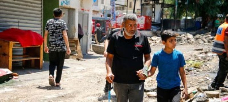 displaced-palestinians-walk-through-the-nour-shams-camp-in-the-west-bank-cd6b5552f553c3722de1fd0f371bfb931736396827.jpg