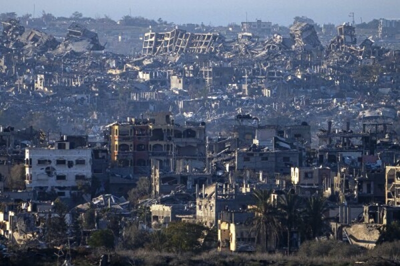 destroyed-buildings-are-seen-inside-the-gaza-strip-from-southern-israel-monday-jan-29eea39e4469e1194e268626bda570821736824866.jpg