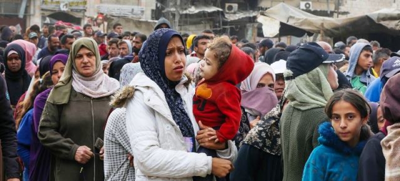 women-and-children-queue-for-bread-at-a-bakery-in-khan-younis-8d299178084f2f35c7a35a69d3cf272e1736992429.jpg