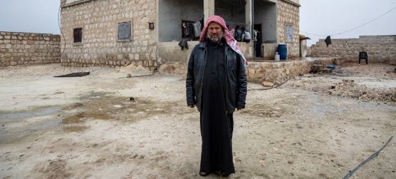 a-man-stands-outside-his-familys-rehabilitated-home-in-southern-rural-aleppo-syria-ec73757b2fc2e28feadb2937f4589abd1738257430.jpg