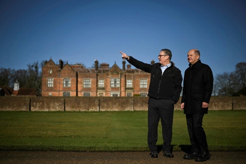 british-prime-minister-keir-starmer-left-speaks-with-germanys-chancellor-olaf-scholz-as-they-have-a-walk-in-the-garden-of-the-chequers-in-aylesbury-england-sunday-feb-0bf45e1a784d3d0e3e2617cf0647fc861738545021.jpg