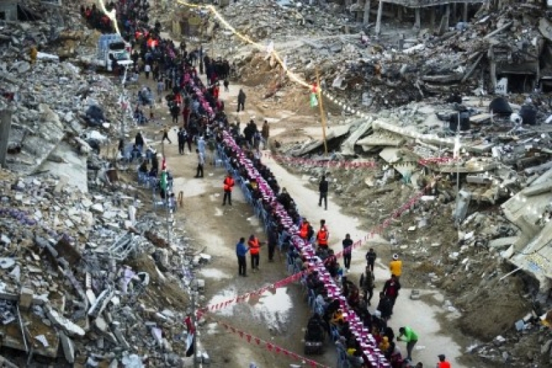 palestinians-sit-at-a-large-table-surrounded-by-the-rubble-of-destroyed-homes-for-iftar-the-fast-breaking-meal-on-the-first-day-of-ramadan-in-rafah-southern-gaza-saturday-march-1-2025-ap-photo-abdel-kareem-h-bf8867c96b0fcbe0800e87d3d55d0ba21740889366.jpeg