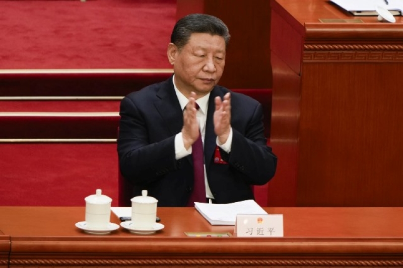 chinese-president-xi-jinping-applauds-during-the-opening-session-of-the-national-peoples-congress-npc-at-the-great-hall-of-the-people-in-beijing-china-wednesday-march-5-2025-77a3b5776345e4273d2737e86299caba1741147792.jpg