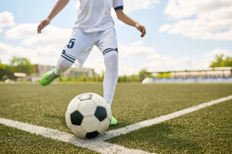 6235ea7fbaf601e8d3980228_boy-kicking-ball-on-football-field-2021-09-24-03-47-56-utc-min-min-582cfded71e99a4b2fd5103ba576e7b51746520456.jpg