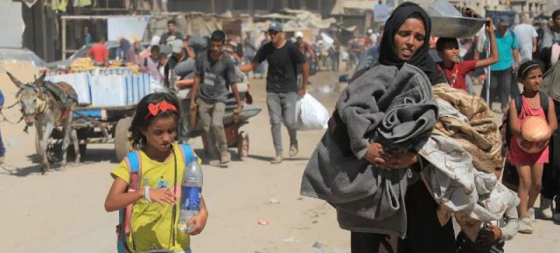 a-displaced-family-leaves-the-eastern-area-of-deir-albalah-after-israeli-authorities-issued-an-evacuation-order-for-the-area-fd61d705deeca301c32ea36447aadb1a1749751480.jpg